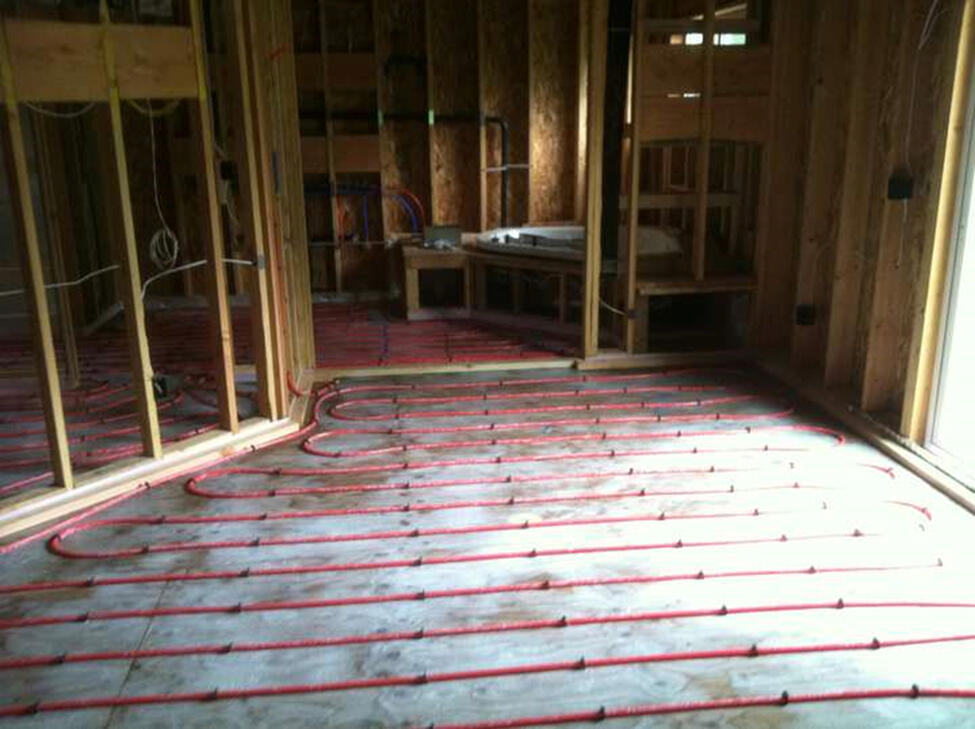 Radiant floor tube layout - tubing laid out waiting for flooring to be installed over it